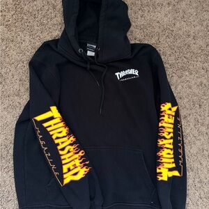 Thrasher Black Hoodie with Fiery Orange Sleeve Design